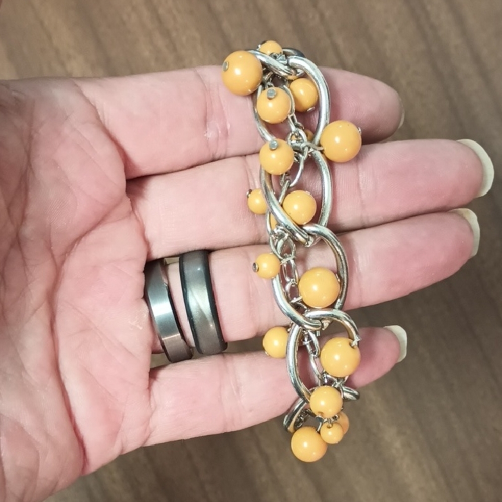 Cha Cha Silver Tone and Orange Beaded Bracelet